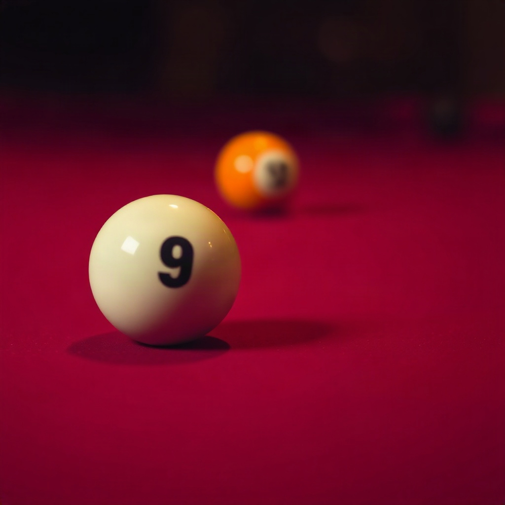 Cue ball and object ball on burgundy felt